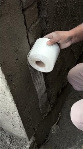 the process of installing a net for plastering walls #construction #plastering #wall #shorts