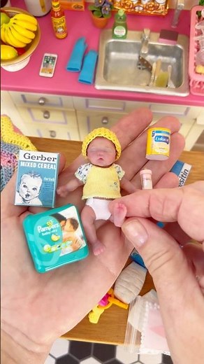 Bath time and bottle time for the miniature silicone baby doll.