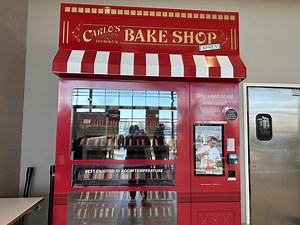 A ‘Cake Boss’ vending machine. At the Bon Jovi rest stop. This is New Jersey.