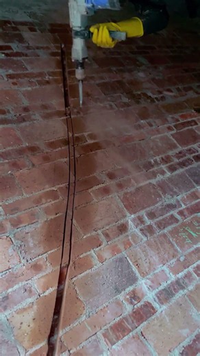 Drilling wall holes for electrical conduit installation safely