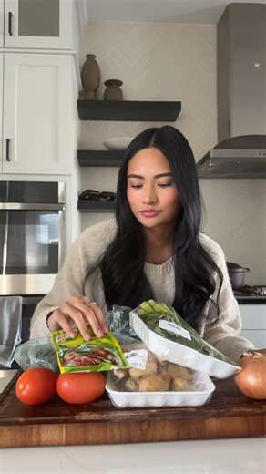 KAYLA K GOMEZ on Instagram: "Salmon belly Sinigang 😋 my favorite Filipino dish growing up!!!"