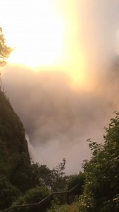 Sunrise from viewing point 2 - very bright! | Victoria Falls Photos