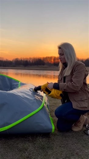 The video shows me inflating a fully inflatable boat. At first, it looks like a large deflated structure on the ground. As air fills the chambers, the shape becomes firm and structured. Once fully inflated, it resembles a regular motorboat in size and form. I launch it onto the river, and it moves steadily across the water just like a standard boat. The only difference is that every part of it, from the hull to the sides, is completely inflatable. this text and video are completely fictional and