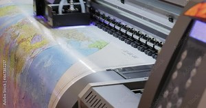 Modern Digital Large format UV printer. Printing production technologies. UV pinning is the process of applying a dose of low intensity ultraviolet light to a UV curable ink