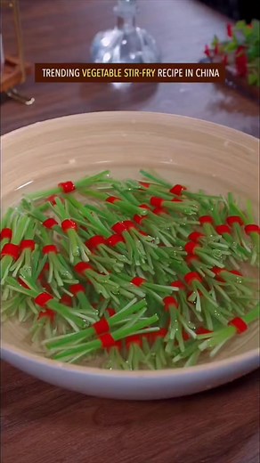 Trending vegetable stir-fry recipe in China, have you ever tried garlic scapes before? #chinesefood #Recipe #cooking #reels | Street Food The World