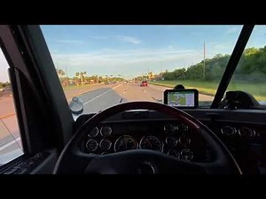 POV driving a Freightliner Coronado