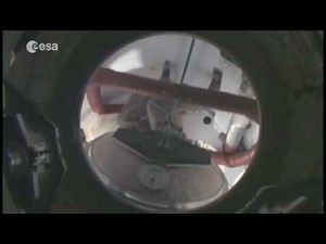 Space Shuttle Discovery docks with the ISS