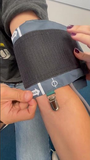 Placing BP cuff with assistance