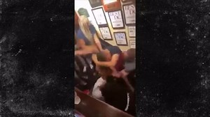 Woman Dragged by Hair Seen Throwing Punches, Lawyer Calls it Self-Defense