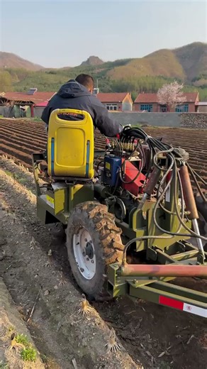 Tractors are plowing the fields! "Farmland Work," "Rural Scenery," "Agricultural Machinery"