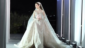 This magical bridal entrance is the stuff of dreams! Surrounded by breathtaking visuals, enchanting lighting, and an atmosphere straight out of a fantasy, the bride made an unforgettable appearance that left everyone in awe. Draped in a fully embroidered couture ZUHAIR MURAD gown, she redefined elegance, beauty, and grace. Every detail of this moment was pure perfection – from the mesmerizing setup to the sparkling gown that caught the light in the most magical way 🌟 Watch as the bride takes ce