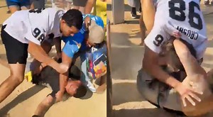 VIDEO: Wild Fight Between Raiders & Chargers Fans Results In Multiple People Being Knocked Out Cold & One Woman Getting Body-Slammed Outside SoFi Stadium