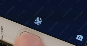 Unlocking of a smartphone using a biometric fingerprint scanner Stock Video