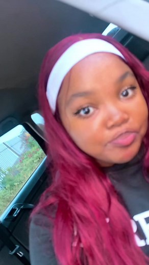Burgundy Hair Transformation Amid Thunderstorm