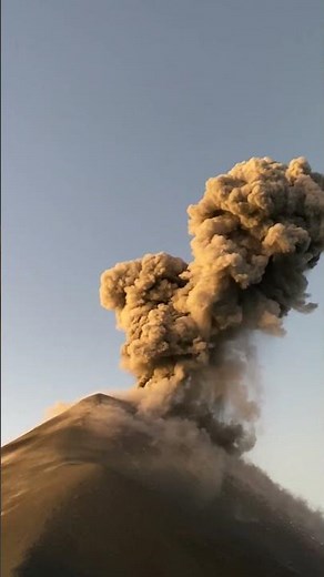 Fuego Volcano Erupts Lava and Ash Plume at Sunrise in Guatemala