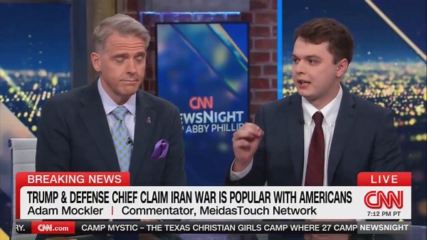 Get your f***ing hand out of my face': CNN pundit Scott Jennings blows up in Iran debate