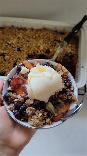 This homemade blueberry peach crisp features fruit kissed with maple syrup and topped with a brown sugar oat topping. It is wonderful on its own and even better with a scoop of vanilla ice cream. Full printable recipe: https://cookingwithcarlee.com/blueberry-peach-crisp/ Ingredients 6-8 cups sliced peaches 3 Tablespoons maple syrup 4 cups blueberries ⅓ cup oat flour 2 cups old-fashioned oats ¼ teaspoon salt ⅔ cup light brown sugar packed 1 teaspoon ground cinnamon ½ cup unsalted butter softened 