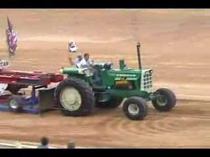 Oliver with Cat power farm stock pulling