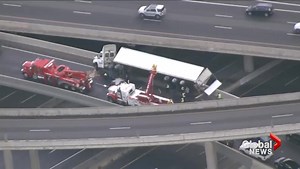 Tractor-trailer rollover causes shutdown on Highway 401