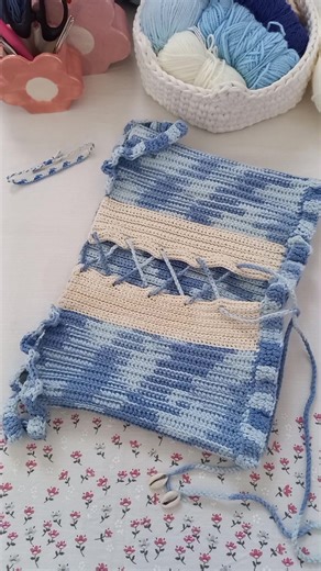 Crochet top Tayyugt which means waves in Tamazight, I handmade some embroidered tags and a matching bracelet too 🌊🪡🧶 #crochettiktok #crochet #handmade #crochettok #yarn