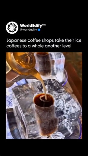 worldEdify™🌍 on Instagram: "Japanese coffee shops elevate iced coffee into an art form, with Kobe’s historic Nishimura Coffee Shop leading the way. Founded in 1948, Nishimura showcases meticulous craftsmanship through a unique summer presentation: coffee is poured into a massive, sculpted block of ice with a cup-shaped hollow. This method keeps the drink intensely cold without dilution, offering both functionality and theater. Patrons sip directly from the glacial vessel, and once the coffee is