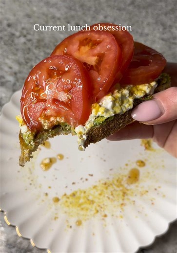 My current high-protein lunch obsession: sourdough avocado toast with Tajín, cottage cheese, nutritional yeast, tomatoes, flaky salt, and hot honey. It’s a mix of protein, healthy fats, and flavor. 😍 #easyrecipe #highprotein #easylunch #healthyrecipe #foodtok