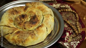 Ramadan Fasting. Iftar meal. Burma is a dish of Crimean Tatar cuisine, in the form of a roll with a filling