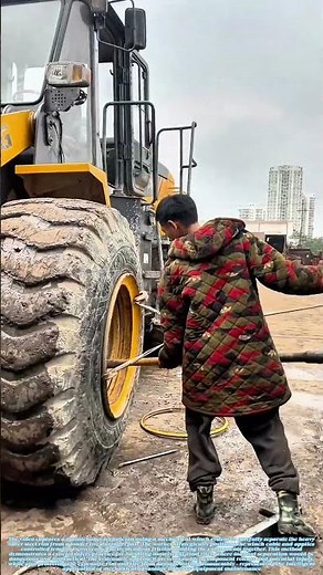 Unlocking the Rim: How a Winch System Safely Dismantles Giant Loader Tires