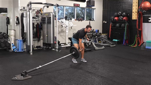 The rotational RDL to press is a great full body landmine move. Joe Drake, coauthor of The Complete Guide to Landmine Training, explains how to perform the exercise. How to Do It: 👉🏽 Start: Stand parallel to the landmine with the right hand gripping the end near the left leg, right foot slightly back. 👉🏽 Movement: Maintain a soft bend in your left knee, hinge at the hips until the bar is near knee level. 👉🏽 Explosion: Drive up and rotate your body, pressing the landmine up with your left h