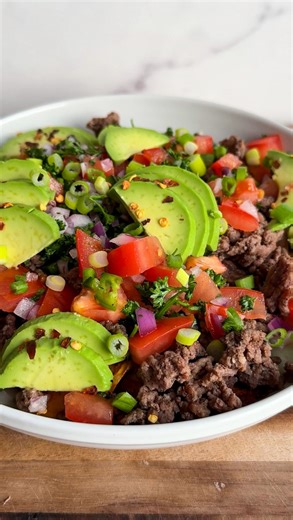 @thefeedfeed on Instagram: "It’s #trendingtuesday and @alexawhatsfordinner is making Sweet Potato Nachos 🍠 Comment ‘RECIPE’ to have the details sent to your DMs or get the recipe below. INGREDIENTS: 2 sweet potatoes, thinly sliced Extra virgin olive oil Kosher salt Pepper 1/2 pound ground beef 1/2 teaspoon cumin 1/2 teaspoon garlic powder 2 tomatoes, diced 1/4 red onion, diced 1/4 cup cilantro, chopped 2 limes, juiced 1 jalapeño, minced 1/4 cup shredded Havarti cheese 1/4 cup shredded cheddar c