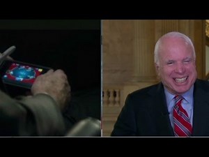 McCain plays poker during Syria hearing