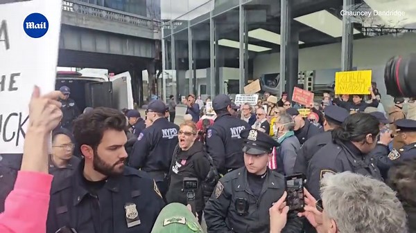 Protests against Elon Musk break out at NYC Tesla dealership