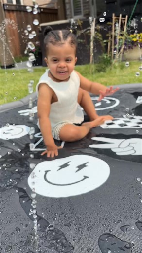 This Splash Pad Makes Your Backyard the Cool House ✨💦 Built to handle multi-kid mayhem. Cute enough for your backyard. 🥳 Oversized to fit siblings & friends for all-day fun 🧼 Non-slip surface = fewer slips, more laughs ✅ No pump or inflation needed (connect a hose & go!) 🌱 Made with safe, BPA- & phthalate-free materials ✨ Clean, modern design that looks great in your yard From playdates to parties, this splash pad was made to share. Set it up in minutes, let them run wild for hours. ✈️ Get F