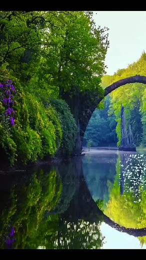 Stunning Stone Bridge Reflected in Serene Water