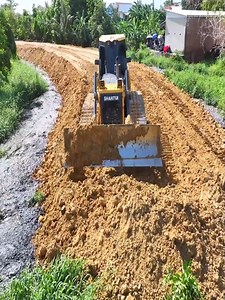 Wonderful!! This site offers an amazing landscape. Using Bulldozer SHANTUI DH17C2 with 25.5T Dump Truck | Sova