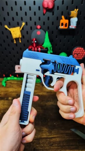 F3D Print on Instagram: "3D Printed Spring Gun with working Magazine #3dprinting Super clean STL on makerworld: https://makerworld.com/en/models/758733"