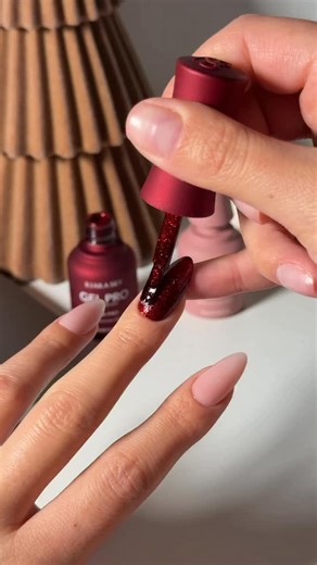 Kiara Sky Nails Official on Instagram: "Okay but this is such a feel-good holiday set 🥹🎄 It’s detailed, festive, and still super wearable. Exactly the kind of look you end up staring at way longer than you meant to. Made using the Gel Pro Holiday Edit from @kiaraskynails, because of course it was. Save this for holiday inspo or send it to the nail tech who always nails it ✨💅 This glittery red shade 🤤: Sweet Seduction #kiarasky #kiaraskynails"