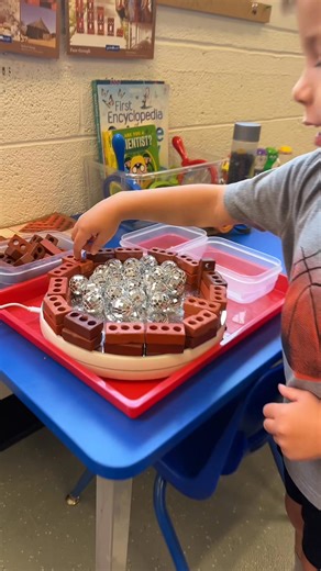Biggest hit at the science table this week 🪞🔁 I taped a mirror to a turntable, set out Guidecraft mini bricks mini disco balls, and kids built as the table turned—watching reflections morph and designs change. Why it’s great: fine-motor control, spatial reasoning, visual tracking, symmetry/reflection, cause-and-effect, rich vocab (“rotate,” “reflect,” “pattern”). Calm focus tons of creative builds. Everything’s in my Amazon storefront. | Preschool Vibes