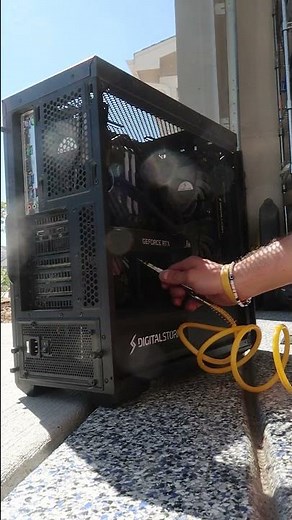 Using air compressor to clean gaming pc