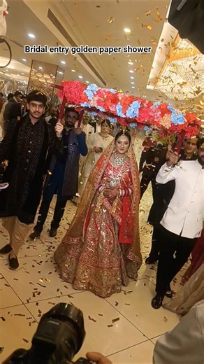 bridal entry with golden paper shower #friends #entry #bridal