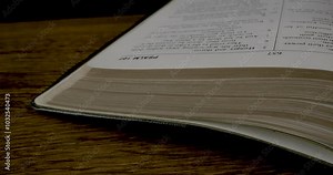 Holy Bible Book Of Psalms Macro Man Hand Turning Pages