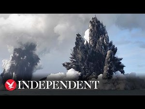 Tsunami waves crash across shore as undersea volcano erupts near Tonga