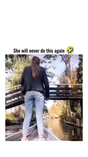 Entertainment on Instagram: "The post shares a 27-second video of a woman playfully dancing and bending provocatively on a wooden bridge over a tree-lined canal, before hanging upside down and jumping into the water below, with friends in a passing boat reacting with laughter. Uploaded on 7 January 2026 by @MikeCitize40336 , a user focused on sharing viral clips, the content has rapidly amassed 101,000 views, 295 likes, and 98 reposts, underscoring the platform's appetite for spontaneous, feel-g