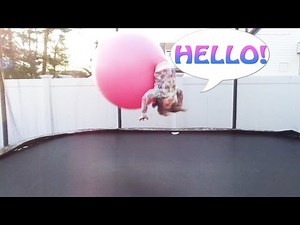 TWINS ON A TRAMPOLINE INSIDE OF A GIANT BALLOON! (BACK FLIPS?)