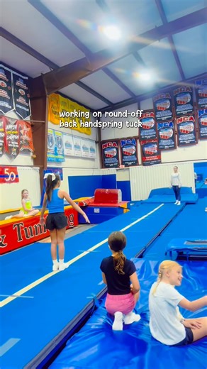 Cherie on Instagram: "Bella working on her roundoff back handspring tuck . #cheerlife #robhstuck #cheertumbling #backhandspringtuck"