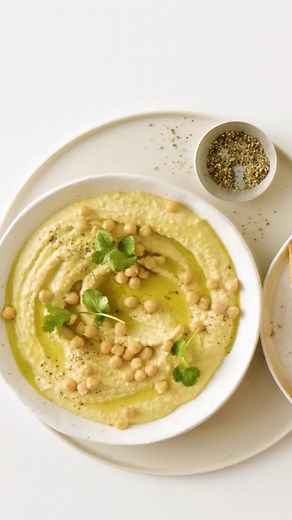 What’s @mattscravat secret to the best-ever hummus? Check out our video and find out! Hit the link in our bio for the recipe or Google “Taste Matt Preston’s Super-creamy hummus”. #tastetestkitchen #hummus #chickpeas #dip #partyfood #easyrecipes | Taste.com.au