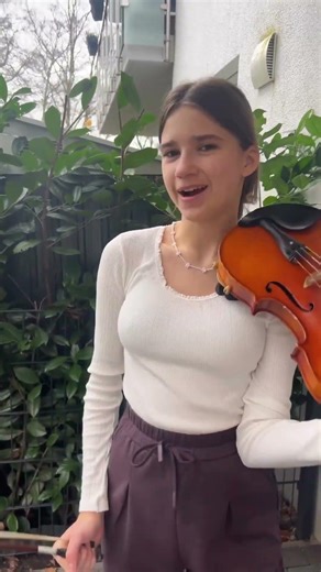 Karolina Protsenko (14 yrs) - Standing on balcony facing park in Germany (Jan 29, 2023)