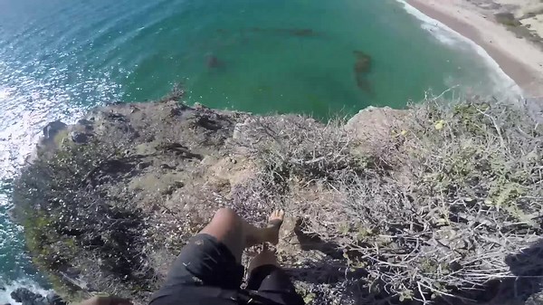Watch This Man’s Heart-Stopping Cliff Jump at Crystal Cove!