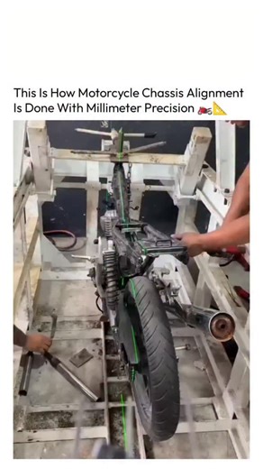 The Technology on Instagram: "A single misaligned degree can completely change how a motorcycle rides, handles, and wears over time. ⚙️🧠 This process uses laser-guided reference lines, fixed jigs, and mechanical leverage to bring the frame, swingarm, and rear wheel back into perfect alignment. The green laser acts as a true centerline, revealing distortions invisible to the naked eye. Instead of replacing parts, technicians apply controlled force to realign the chassis itself, restoring factory