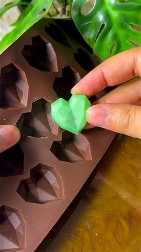 Calligraphy sticker and green heart candle